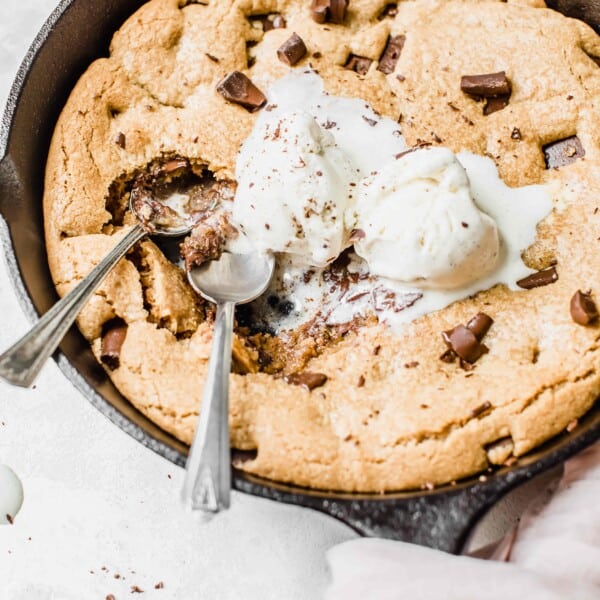 The trifecta of all cookies! Coconutty, chocolatey, soft, chewy, and crispy. All in a skillet! #cookierecipe #cookies #skilletcookie #cookieinaskillet