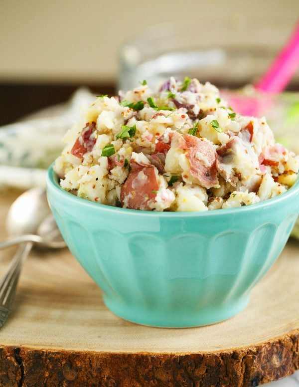 This tangy potato salad is only 4 ingredients and you'll love this new way of eating potato salad. Seriously, give it a chance!