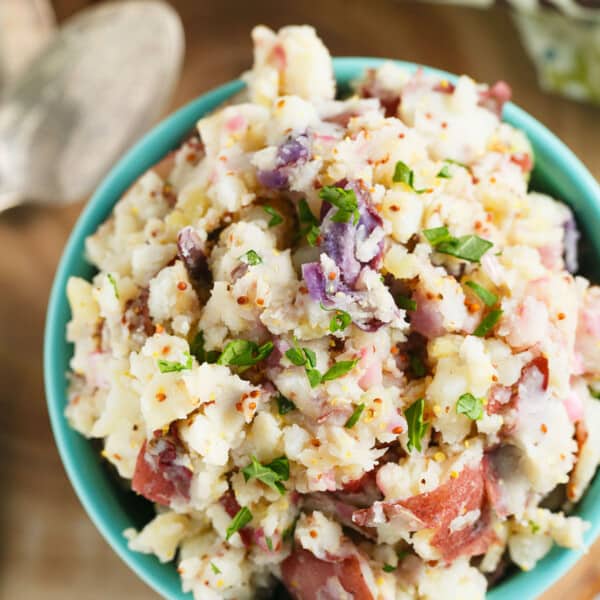 This tangy potato salad is only 4 ingredients and you'll love this new way of eating potato salad. Seriously, give it a chance!