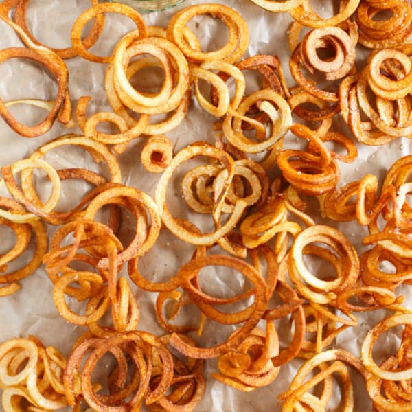 If you are a fan of curly fries and mustard, then this recipe is for you! Homemade curly fries are so versatile and easy to make. You might have a hard time sharing them!