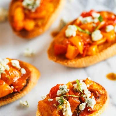 These bites of roasted balsamic tomato crostini are incredibly easy to make and will be one of your favorite appetizers to make for years to come!