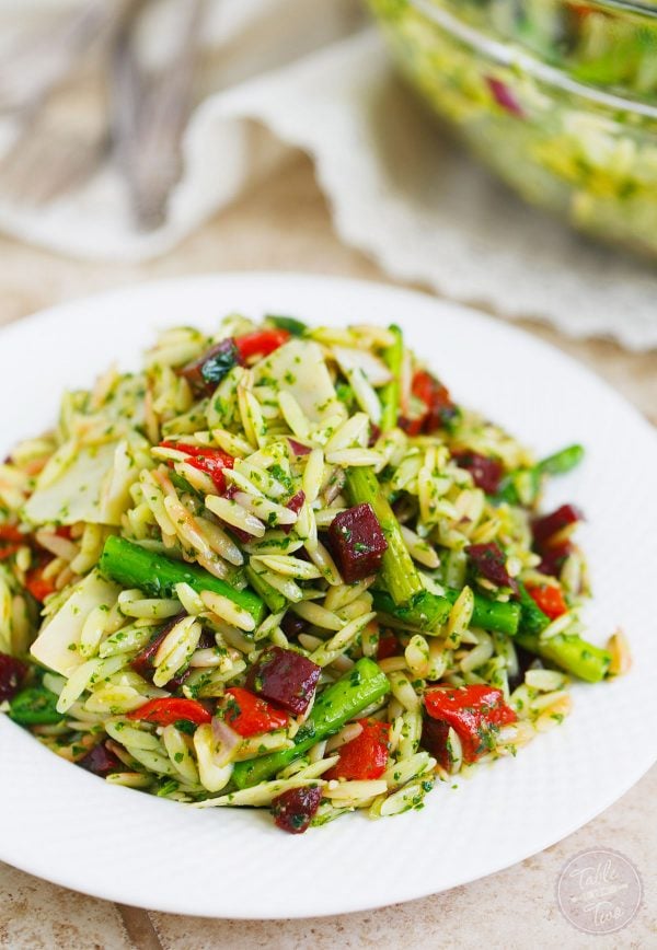 A great springtime pasta salad dish to bring to outdoor events or to have at home! The flavors and colors of this dish will make any day cheery!