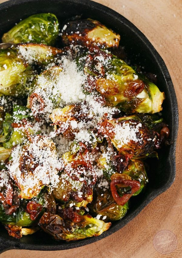 A new side dish for you to try! Roasted brussels sprouts tossed with caramelized shallots and golden raisins topped with salty cotija cheese. You will LOVE this new addition to your dinner table!