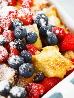 This triple berry brioche French toast bake is a breakfast or brunch dish that your overnight crew will love! Fresh berries are layered throughout the rich and buttery brioche bread. Your family and friends will love you!