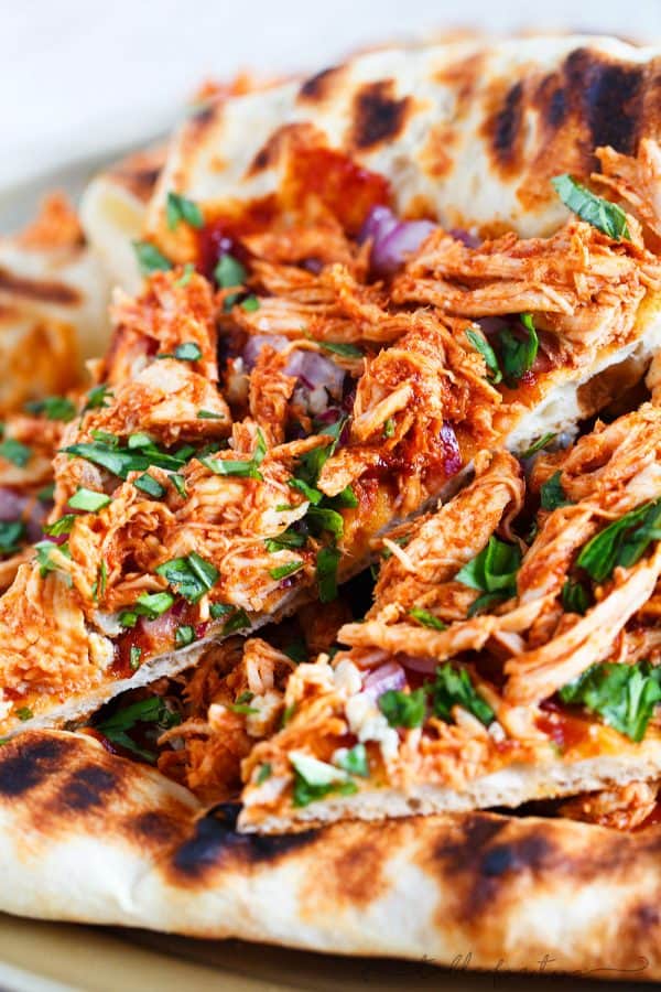 Fire up your grill and make the classic BBQ chicken pizza on the grill!