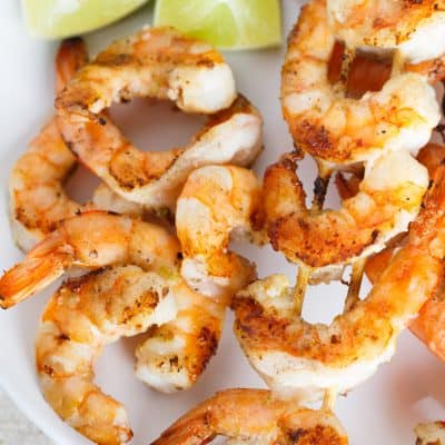 Turn up the grill and make these salted lime butter grilled shrimp skewers for your next cookout! You will love the salty lime and buttery flavor that is slathered all over the shrimp!