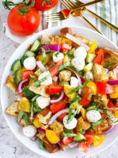 A delightfully light and refreshing summer panzanella salad for your dinner table! This is a great way to use up all the abundant summer produce.