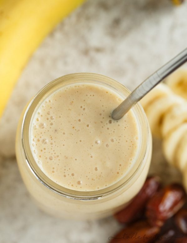 This banana peanut butter & date smoothie is a healthy alternative to curb your sweet tooth! Sweetened naturally with dates, this smoothie is going to be your new favorite "dessert!"