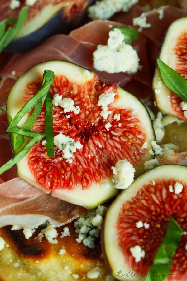 A classic combination of flavors but what better than to throw it on a grilled pizza? The pungent blue cheese pairs so well with the rest of the sweet figs and salty prosciutto!