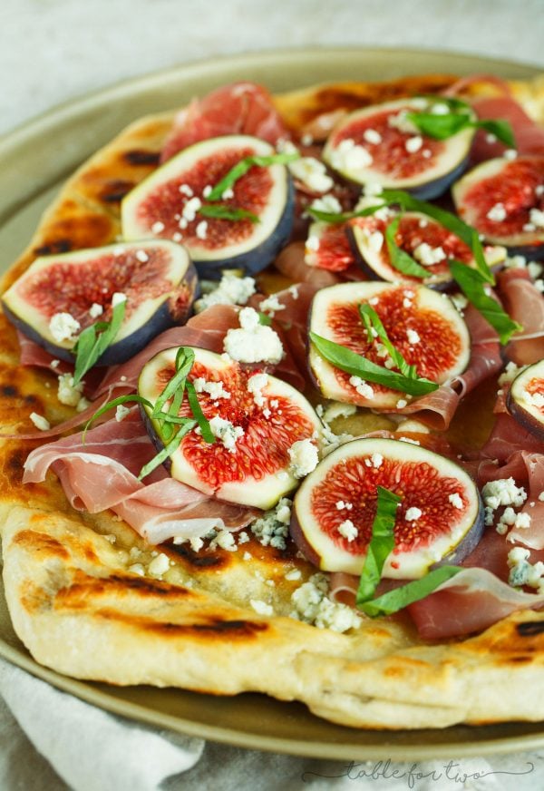 A classic combination of flavors but what better than to throw it on a grilled pizza? The pungent blue cheese pairs so well with the rest of the sweet figs and salty prosciutto!