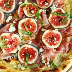 A classic combination of flavors but what better than to throw it on a grilled pizza? The pungent blue cheese pairs so well with the rest of the sweet figs and salty prosciutto!