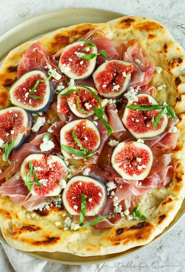 A classic combination of flavors but what better than to throw it on a grilled pizza? The pungent blue cheese pairs so well with the rest of the sweet figs and salty prosciutto!