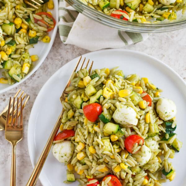 This end of summer pasta salad is a great way to use up the summer's finest ingredients (zucchini, corn, tomatoes, and basil) but realistically, it is great year-round! Easy to put together and it is great served chilled or warm!