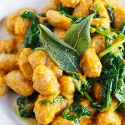 Whole wheat gnocchi with brown butter sage and pumpkin sauce is a deliciously creamy and nutty dish that is full of Fall flavors.
