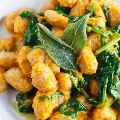 Whole wheat gnocchi with brown butter sage and pumpkin sauce is a deliciously creamy and nutty dish that is full of Fall flavors.