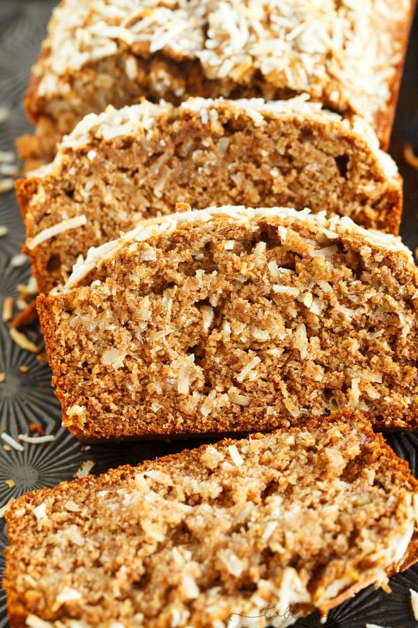 The intoxicating smell of coconut banana bread will be drifting throughout your house as soon as you pop this in the oven! Super moist and tender; you will want to make a double batch!