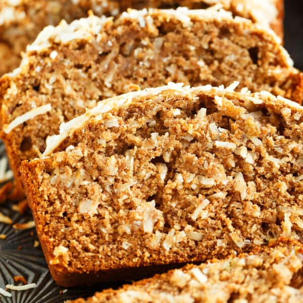 The intoxicating smell of coconut banana bread will be drifting throughout your house as soon as you pop this in the oven! Super moist and tender; you will want to make a double batch!