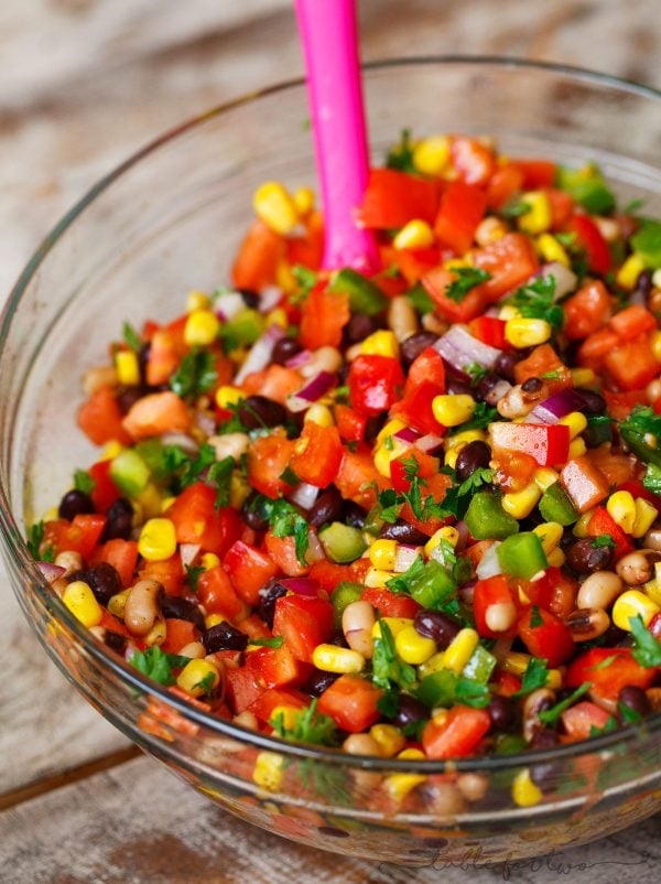 The most colorful salad you will have at your next party or barbecue! Cowboy caviar is like a mashup between salsa and beans. Salsa and beans had a baby and named it cowboy caviar because it's just so hearty and richly delicious!