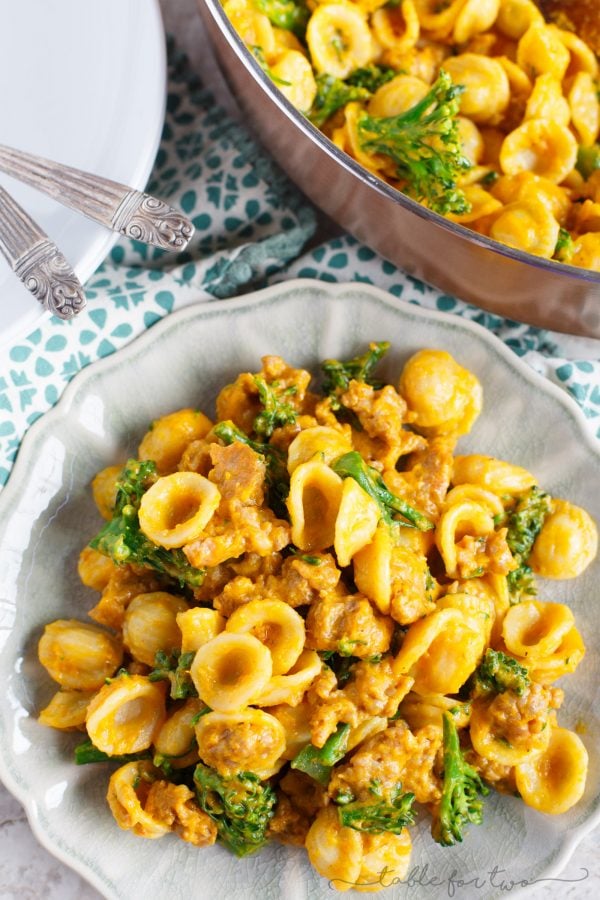 Savory pumpkin dishes are the way to go this Fall if you're in a dinner rut! This pumpkin mascarpone orecchiette with spicy sausage and broccolini will satisfy every person in your family! The pumpkin and mascarpone makes the creamiest sauce and the spicy sausage gives this pasta dish the perfect salty and spicy bite. You will make this over and over again! It's not just a Fall dish!