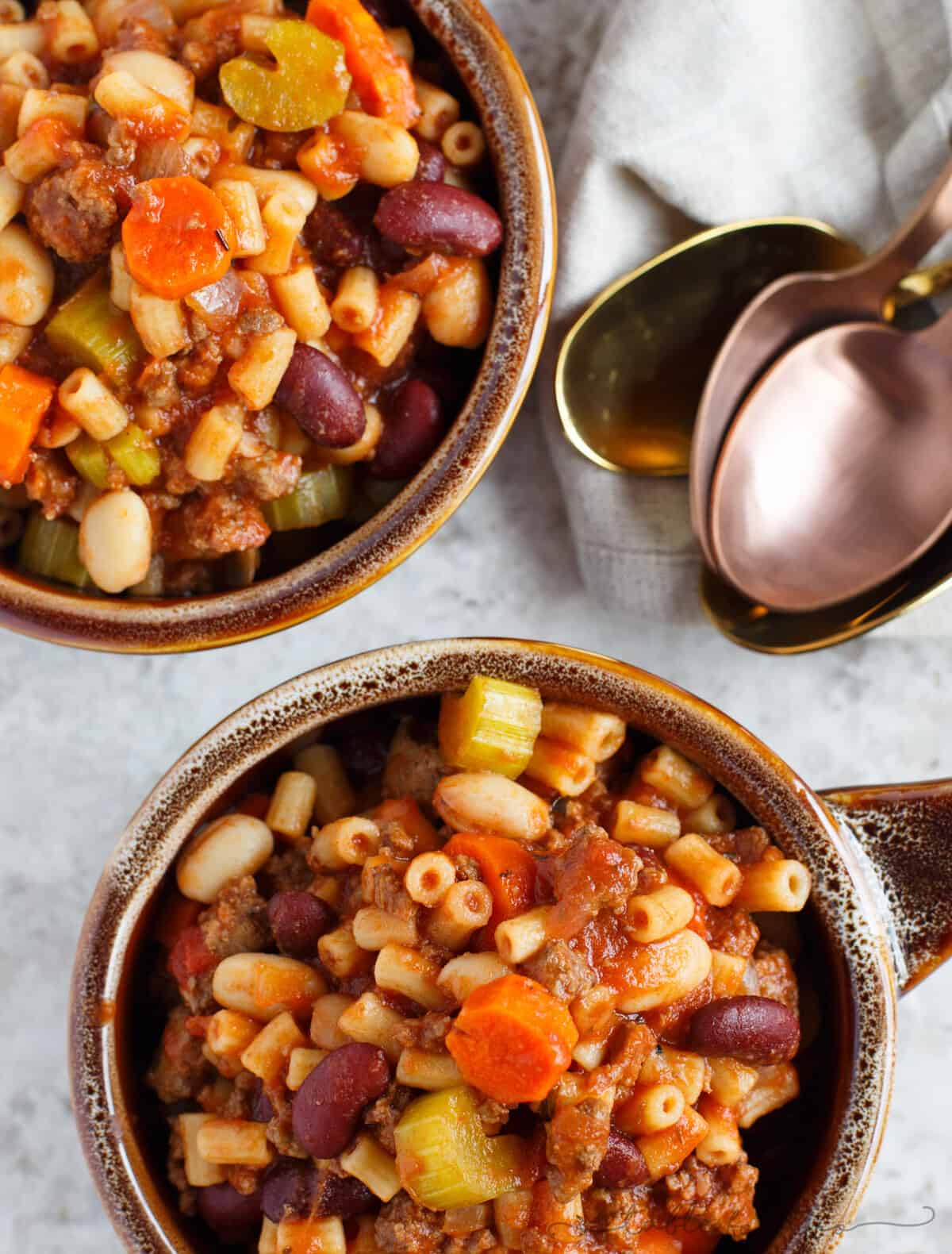 A thick and hearty slow cooker meal. This slow cooker pasta fagioli is full of hearty beef, beans, veggies, and pasta. Makes for great comfort food in the cooler months or for busy weeks that leftovers won't get boring!