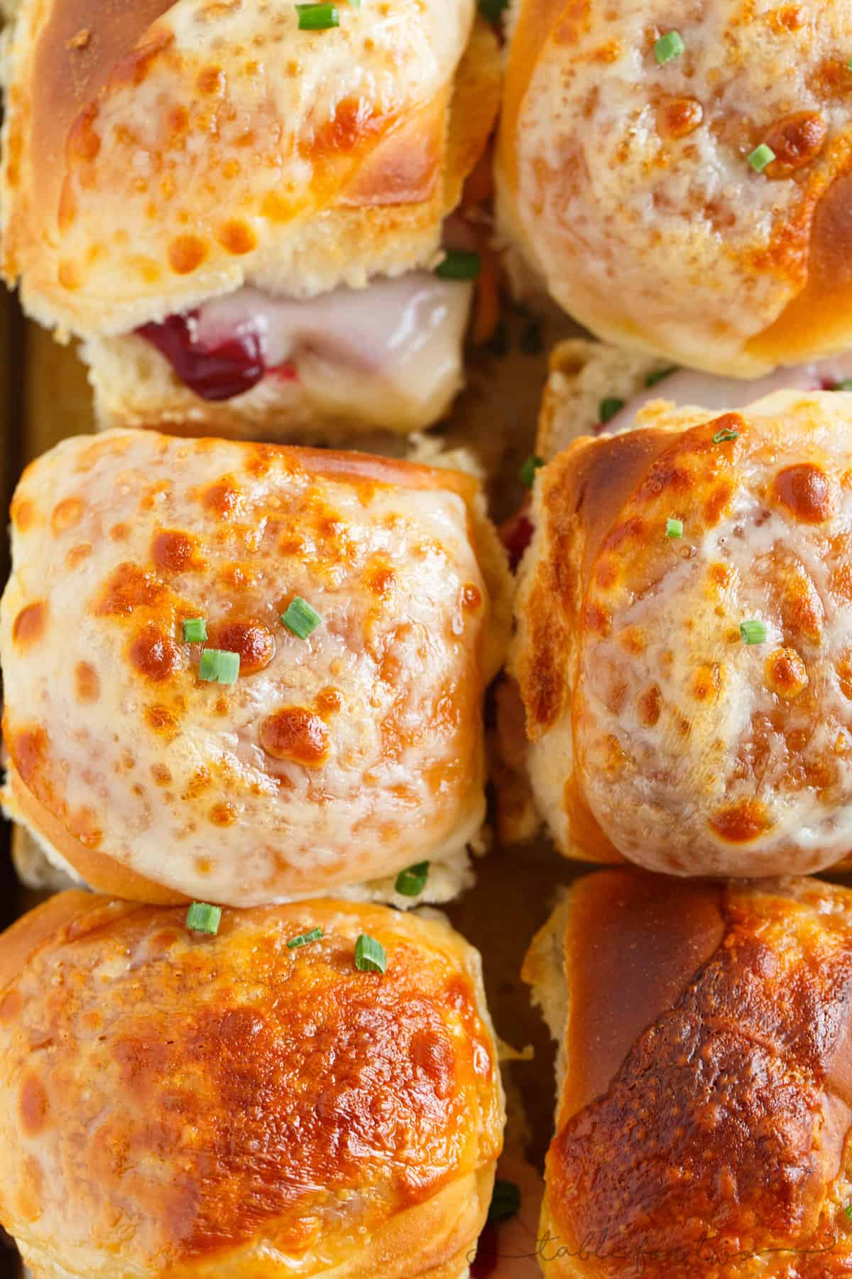 Give Thanksgiving leftovers life again by making these Leftover Thanksgiving Turkey Sliders! An easy and delicious way to use up your Thanksgiving turkey & leftovers!