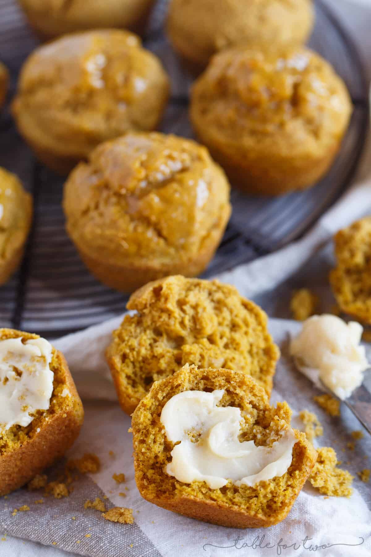 Closeup of Pumpkin Cornbread Muffin cut in half and slathered with maple butter