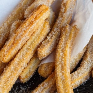 Mexican churros wrapped in paper.