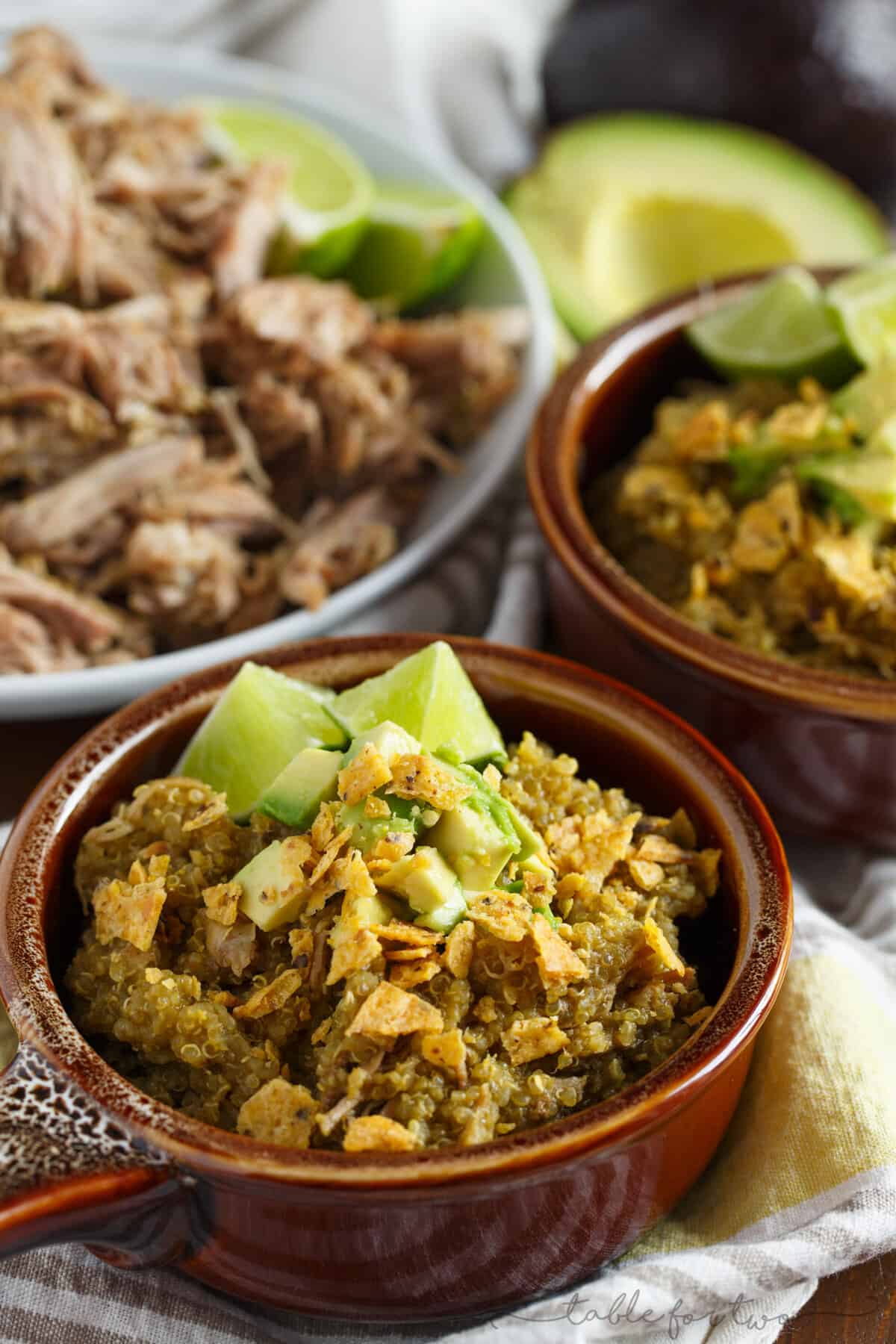 A low-effort weeknight meal with lots of flavor! Slow cooker poblano and tomatillo shredded pork and quinoa is a dish your family will love! The leftovers taste even better after the flavors meld even more! This can even be made in your pressure cooker!