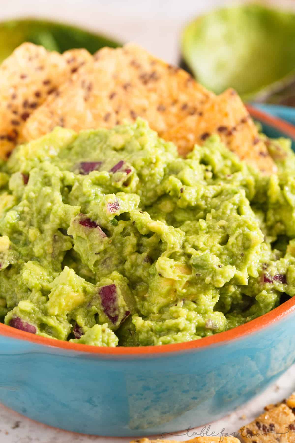 Everyone has to have a great guacamole recipe in their arsenal. Our favorite guacamole recipe is full of creaminess, tang, and bite! You will LOVE this version and always make batches of it to have on hand!