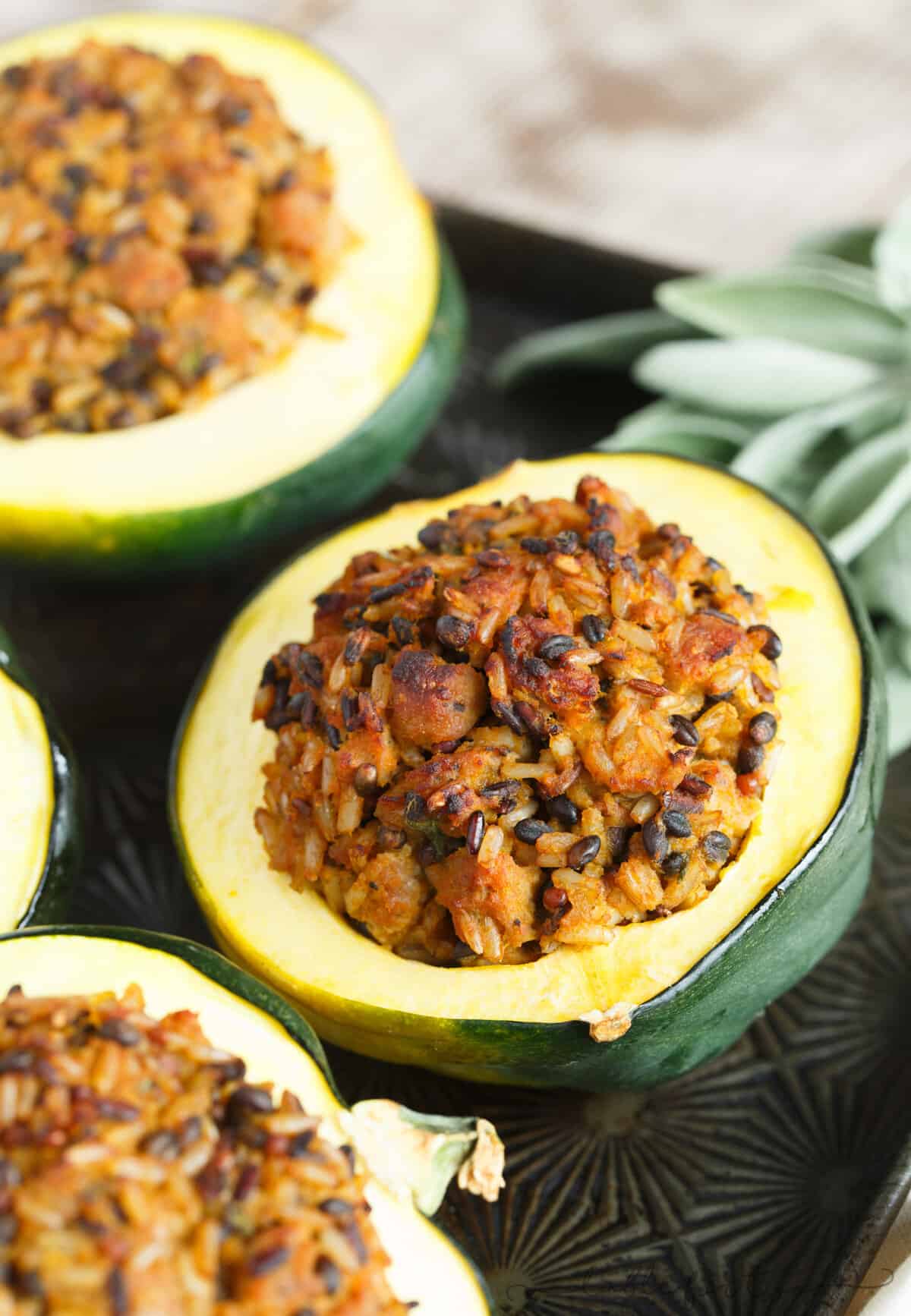 If you love the flavors of Fall, this stuffed acorn squash with sage apple sausage and wild rice is the squash recipe for you! So full of flavor & will fill you right up! A great new recipe to use for acorn squash. Who doesn't love stuffing acorn squash? The best flavors!