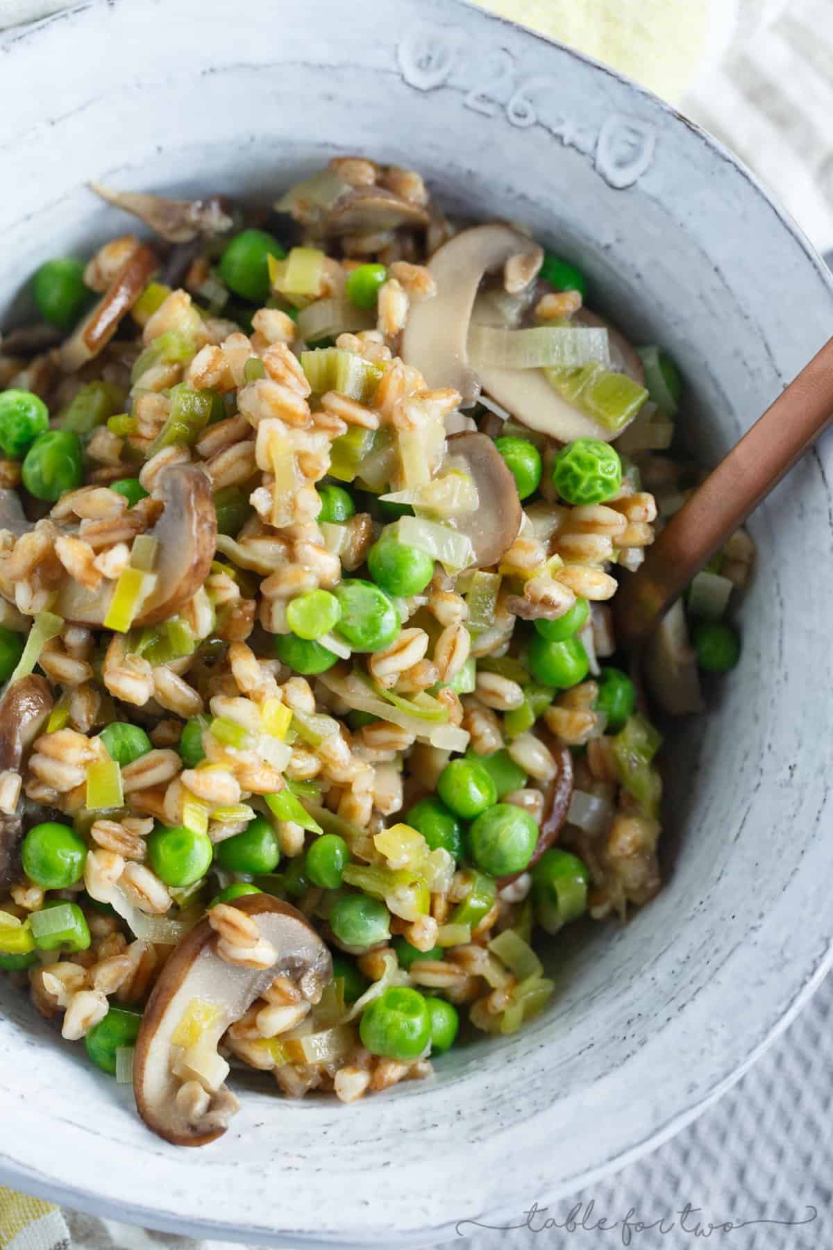 A great way to use farro in this flavorful dish! Filled with leeks, mushrooms, peas, and lots of parmesan cheese; this cozy farro dish is a quick one to whip up anytime of the week!