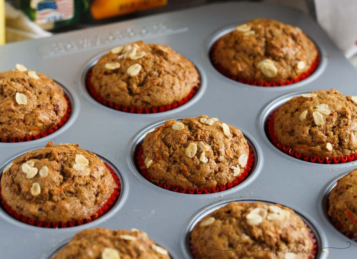 Incredibly flavorful, moist, and fluffy muffins for a quick on-the-go breakfast! Warm spices, orange and carrots make this spiced orange and carrot whole wheat muffin so tender and full of healthy goodness for your mornings!