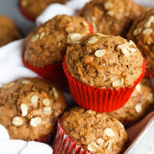 Incredibly flavorful, moist, and fluffy muffins for a quick on-the-go breakfast! Warm spices, orange and carrots make this spiced orange and carrot whole wheat muffin so tender and full of healthy goodness for your mornings!