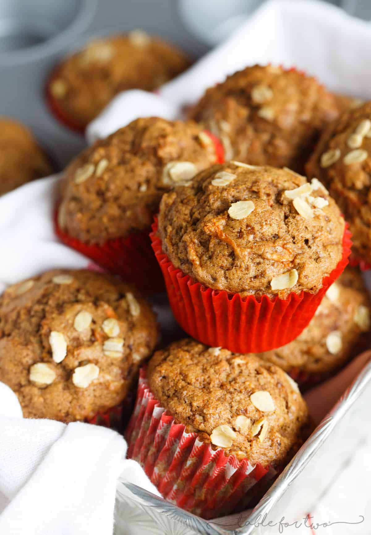 Incredibly flavorful, moist, and fluffy muffins for a quick on-the-go breakfast! Warm spices, orange and carrots make this spiced orange and carrot whole wheat muffin so tender and full of healthy goodness for your mornings!