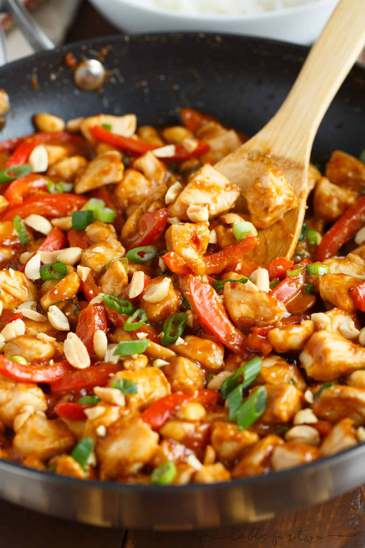 If you've never used peanut butter in a savory dish, this spicy peanut chicken is a dish you must try! It comes together in less than 30 minutes and it's so full of flavor! It will easily become a favorite dinner in no time!