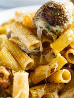 A fun take on the classic Swedish meatballs. This creamy Swedish meatball pasta bake is filled with pasta, cheese, and meatballs; the ultimate comfort food!