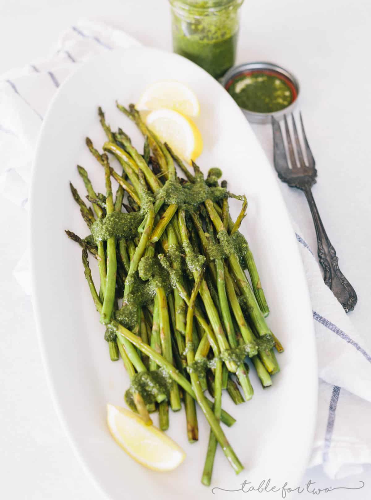 Dress up your asparagus this season with a lemony pesto drizzled all over! This roasted lemony pesto asparagus will be a new favorite side dish!