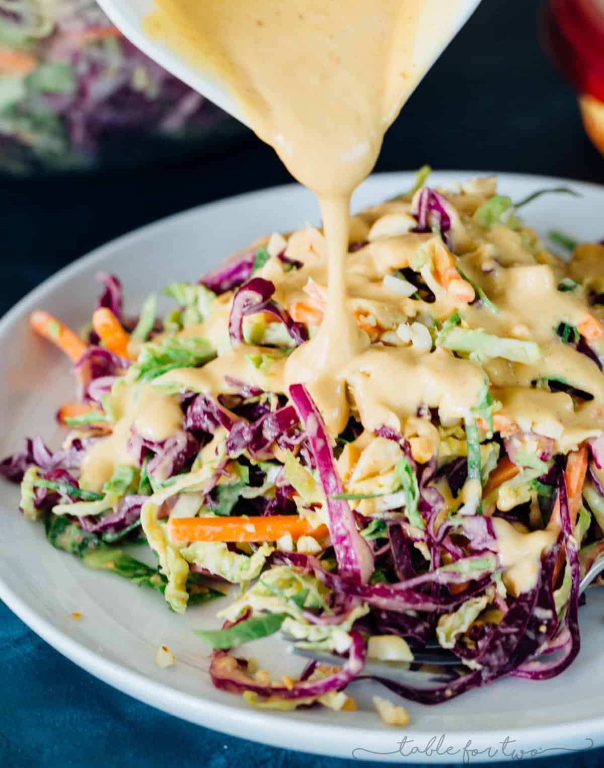 This cabbage slaw is a crisp and refreshing side dish for your next gathering! The creamy hummus dressing made with @sabradips classic hummus is going to be one of your new favorites to drizzle on everything! #ad