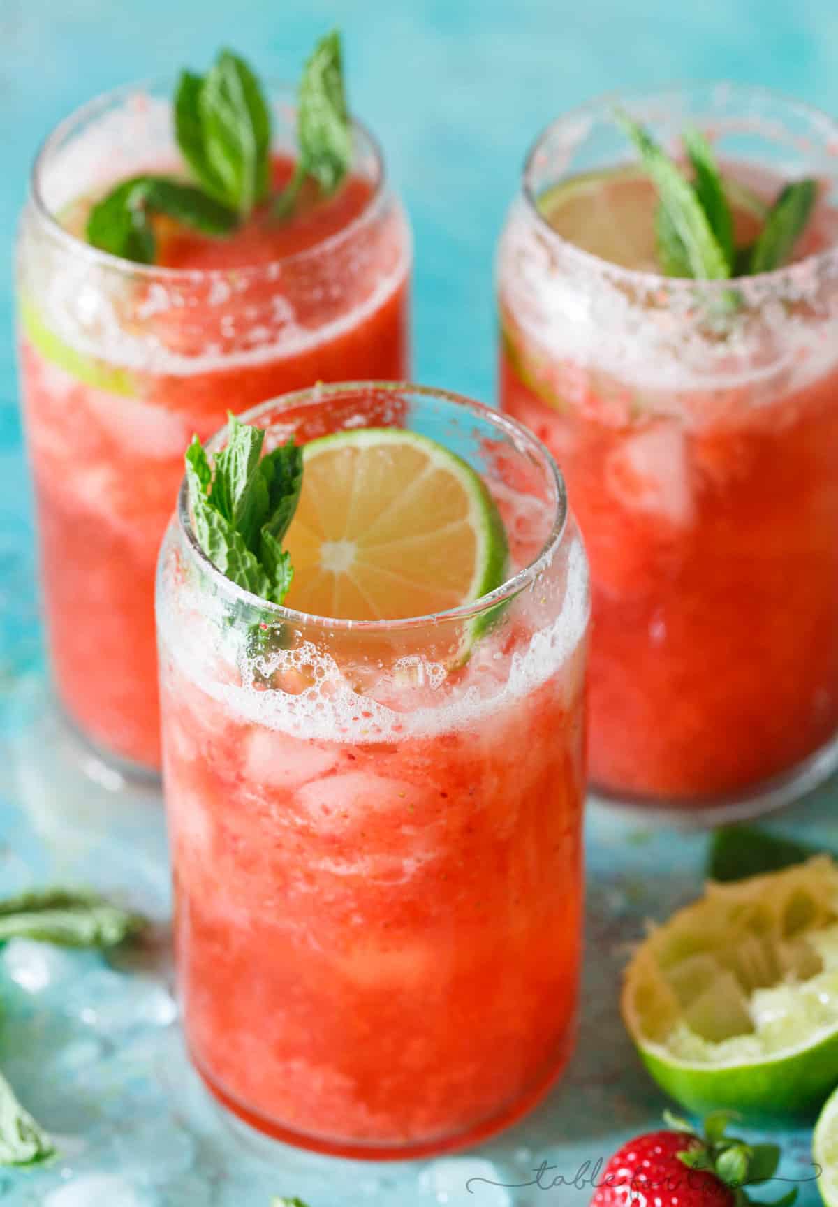This refreshing strawberry rosé mint limeade is made with fresh seasonal ingredients! You will love sipping on this at your next outdoor party or get-together! Fresh strawberries are key and the refreshing mint and tangy lime juice rounds out the flavors of this drink perfectly! Serve with or without alcohol!