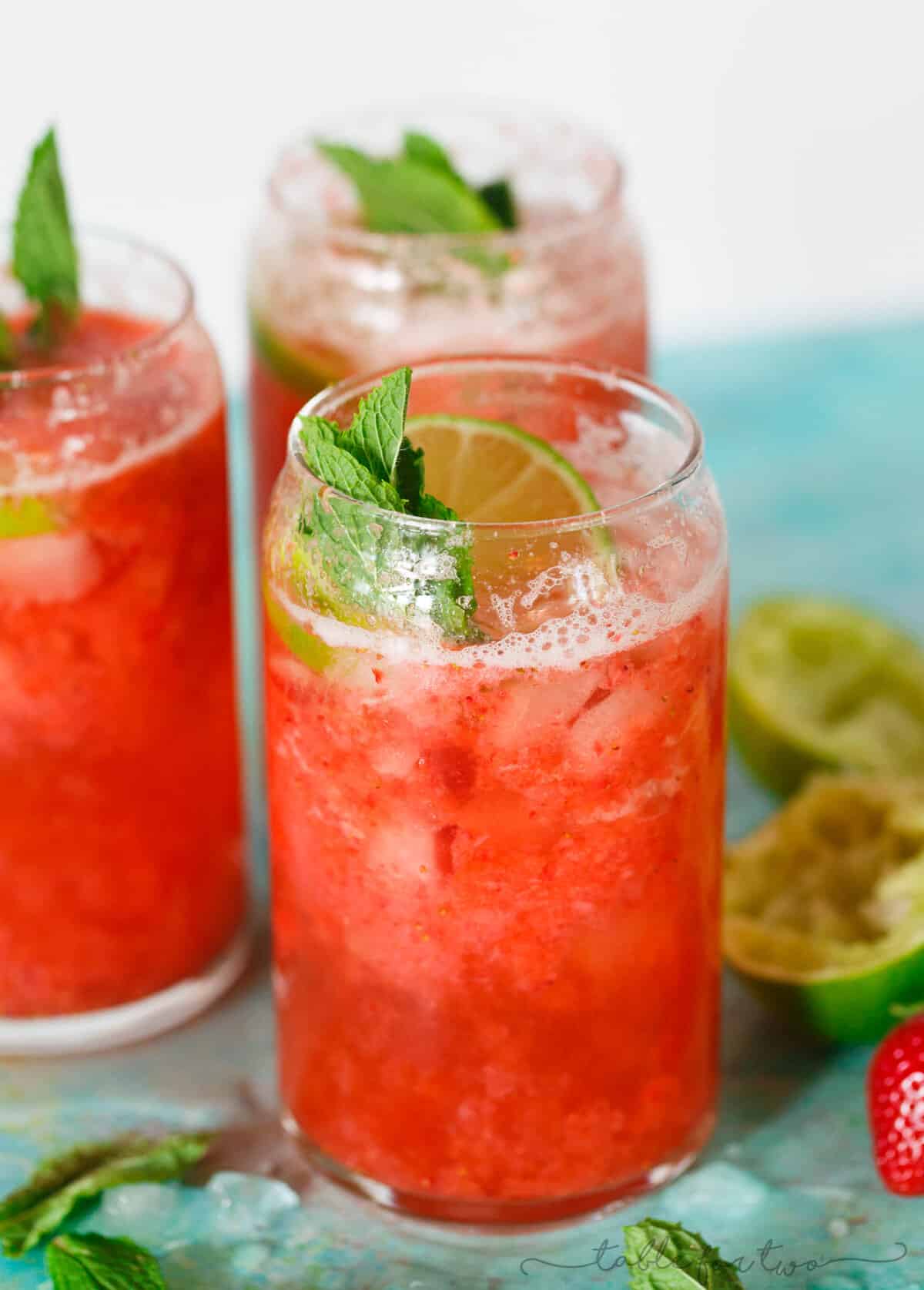 This refreshing strawberry rosé mint limeade is made with fresh seasonal ingredients! You will love sipping on this at your next outdoor party or get-together! Fresh strawberries are key and the refreshing mint and tangy lime juice rounds out the flavors of this drink perfectly! Serve with or without alcohol!