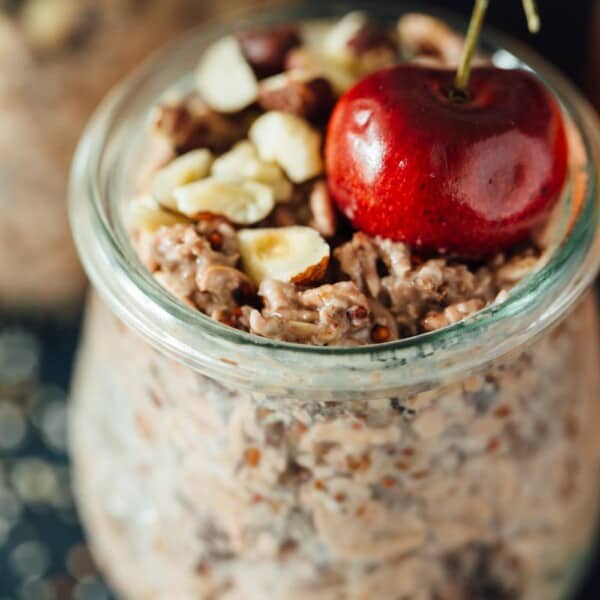 Fresh cherries make the base of this cherry pie overnight oats recipe! This takes no time to put together and you'll end up with a quick on-the-go breakfast the next morning! #TheSoulfullProject #ad