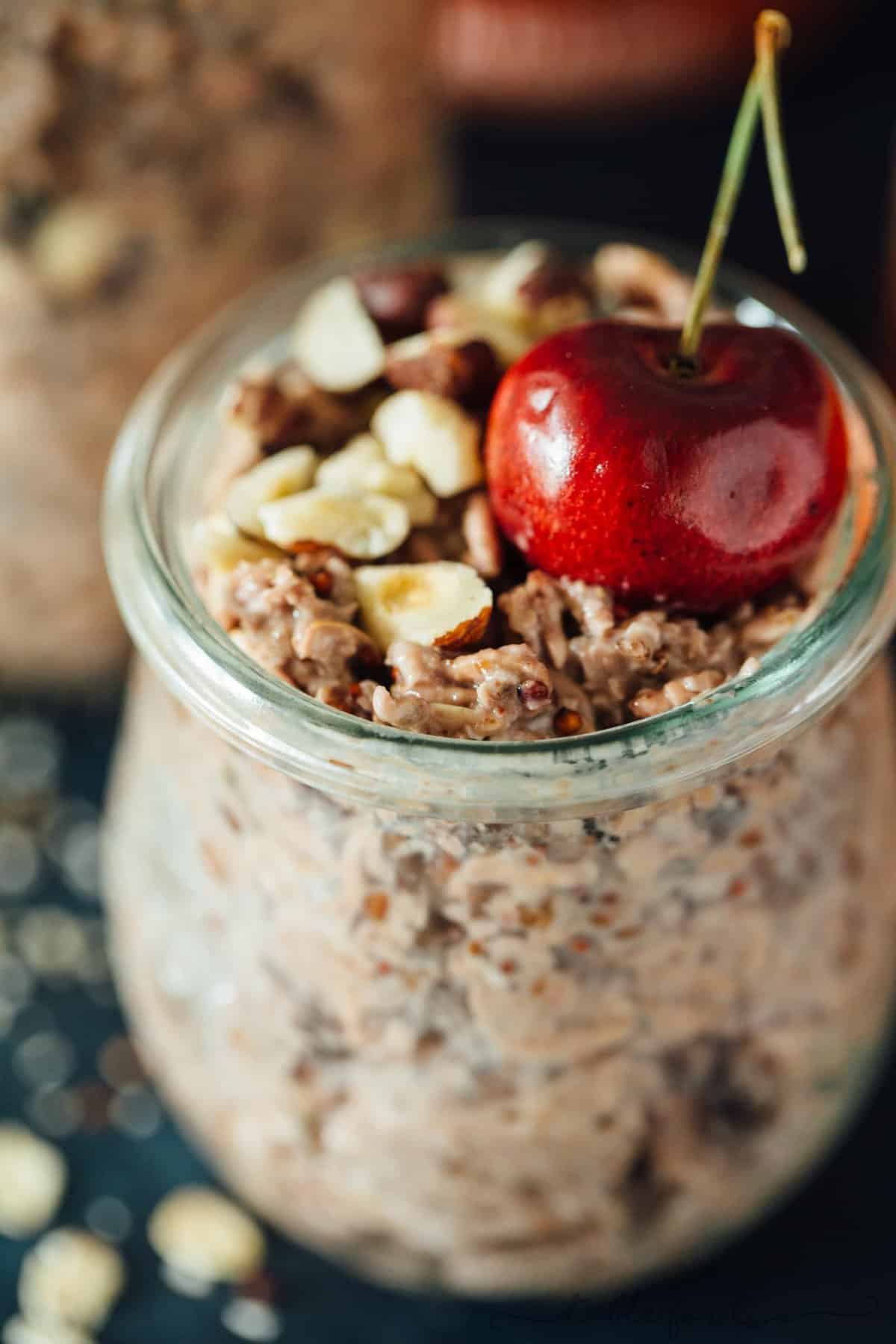 Fresh cherries make the base of this cherry pie overnight oats recipe! This takes no time to put together and you'll end up with a quick on-the-go breakfast the next morning! #TheSoulfullProject #ad