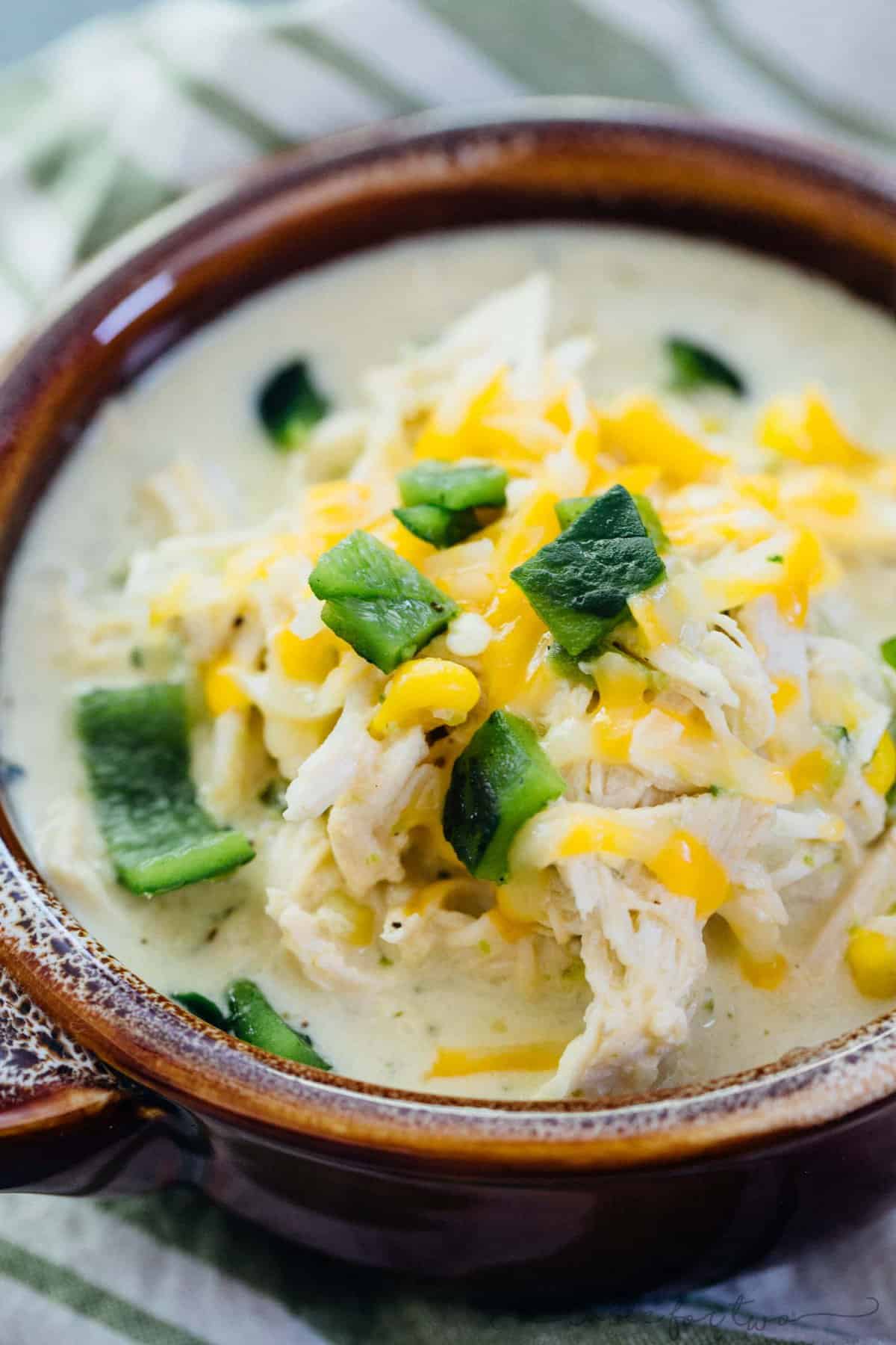 This creamy poblano pepper and chicken soup has all your favorite components in a delicious soup! A subtle hint of spiciness along with the smokey charred poblanos and the creaminess of the soup rounds it all out. I promise this will be a new favorite!