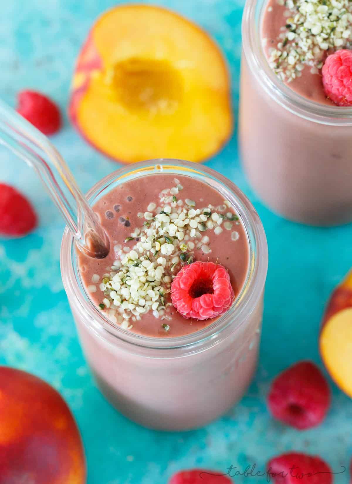 You won't believe that there is spinach in this raspberry peach spinach smoothie! The name doesn't do this smoothie justice as you cannot taste or see the spinach in this! Such a great way to get your daily greens in without the fight!