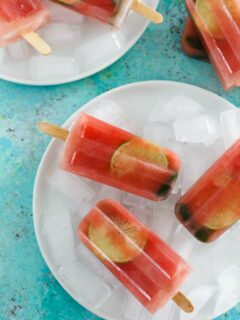 A cool and refreshing summer frozen treat. These watermelon mint lemonade popsicles are the perfect way to cool down! Grab them before they melt!