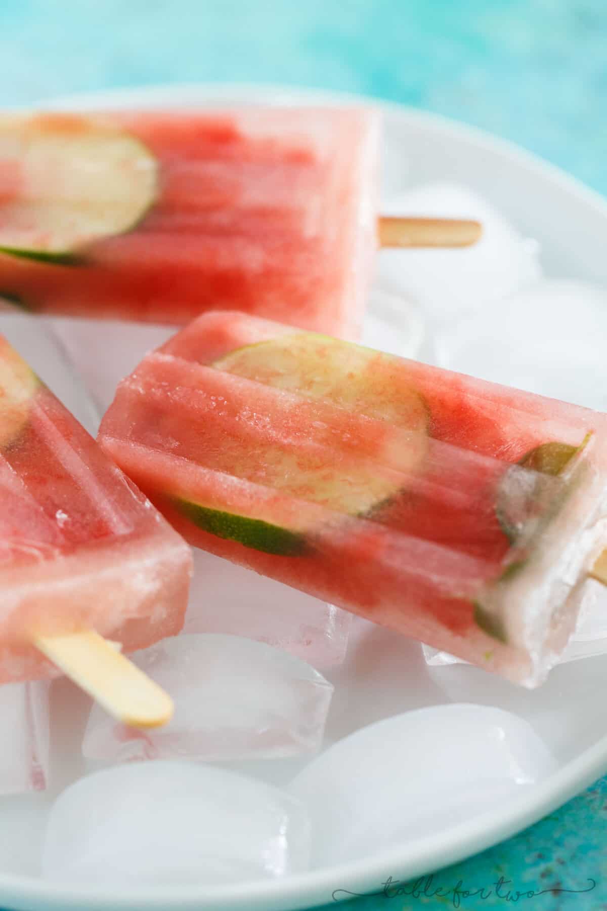 A cool and refreshing summer frozen treat. These watermelon mint lemonade popsicles are the perfect way to cool down! Grab them before they melt!