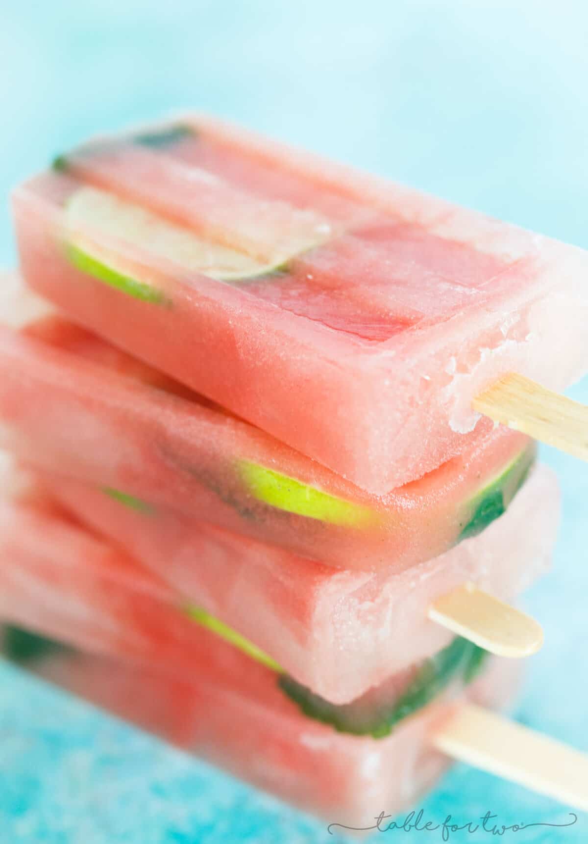 A cool and refreshing summer frozen treat. These watermelon mint lemonade popsicles are the perfect way to cool down! Grab them before they melt!
