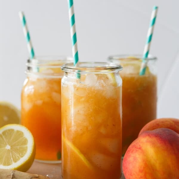 This lemon ginger peach spritzer is so fresh and refreshing that you'll be sipping on this all day! The flavors pair perfectly together and it's so easy to make with all the peaches you've picked up at the market!