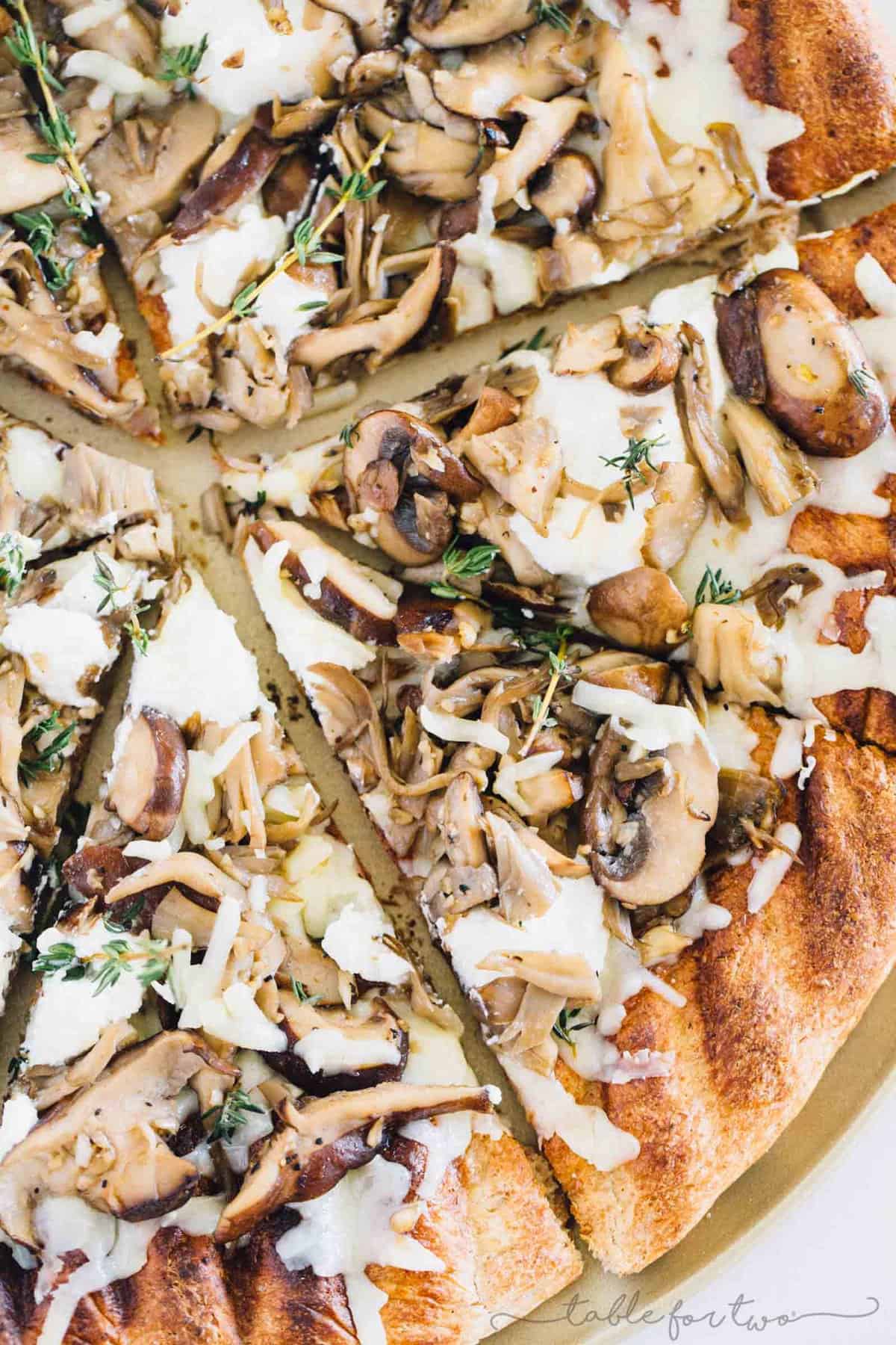 Mushroom lovers will be in paradise with this triple mushroom and herb grilled pizza! The earthy and hearty mushrooms on top of this pizza pair perfectly with the creamy ricotta and mozzarella cheese!