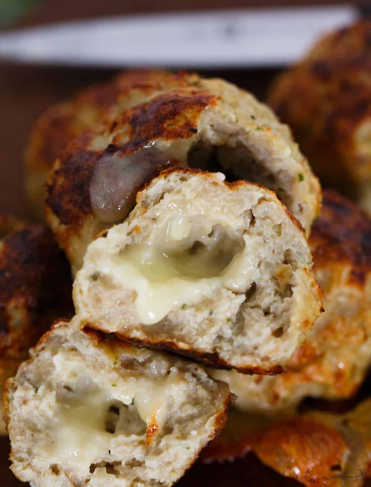 Stuffing anything with cheese automatically makes it exponentially better. These stuffed cheesy chicken apple and sage meatballs give the element of surprise with brie in the center of these!